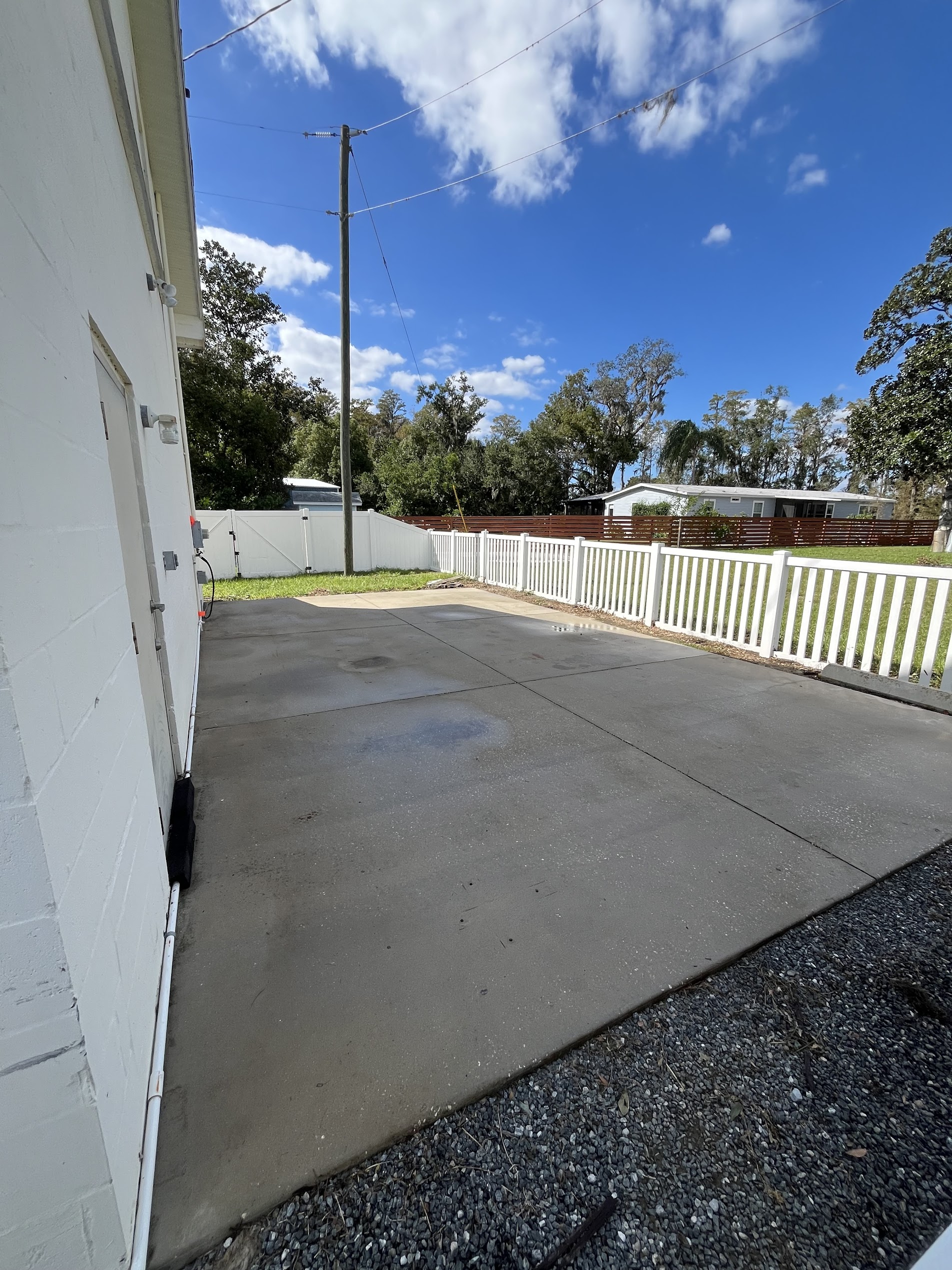Same concrete pad after cleaning