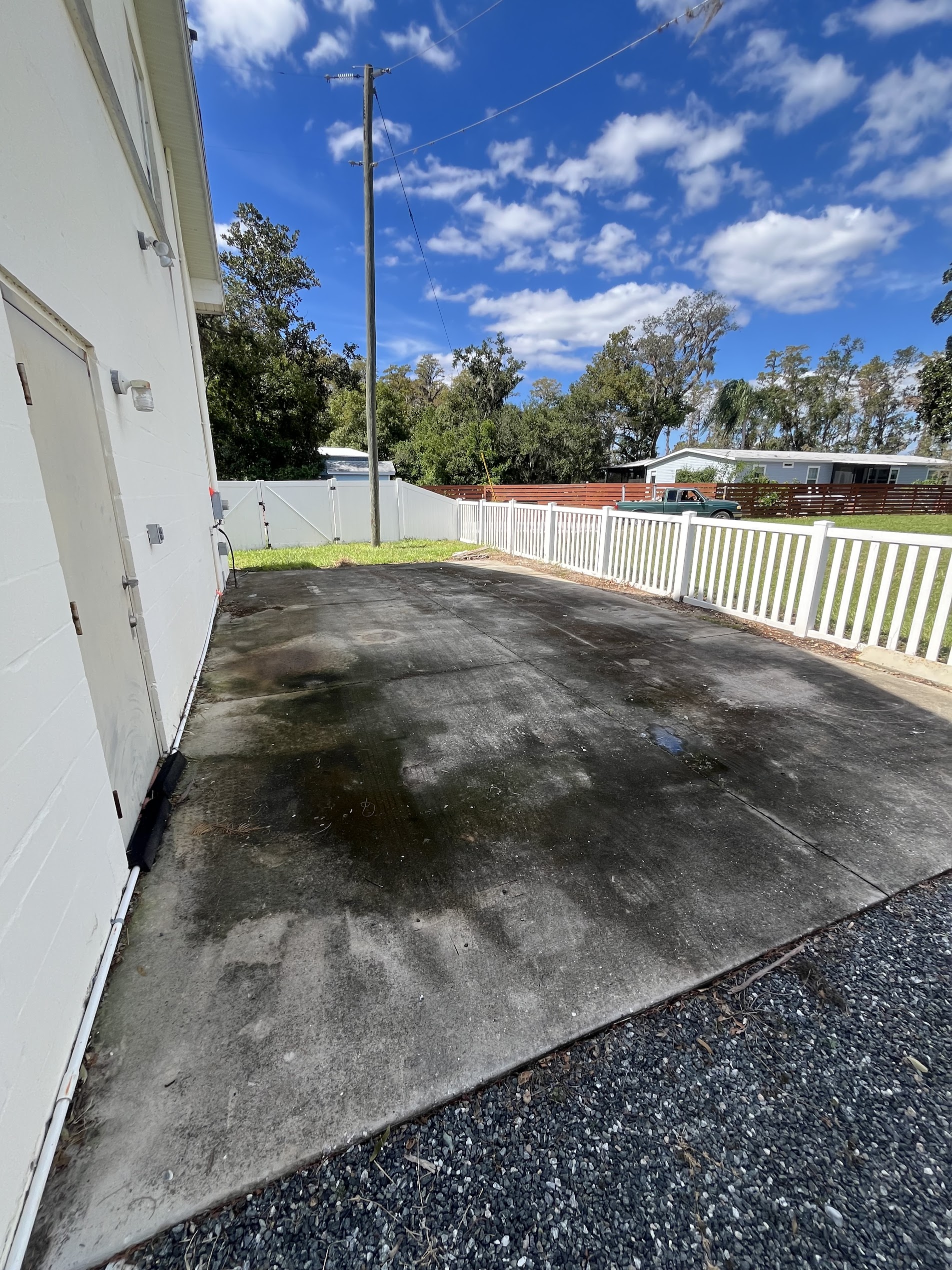 Stained concrete pad before cleaning